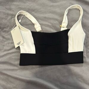 Monday Body swim top. New with tags. Black and ivory